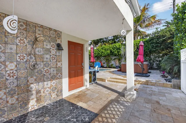 a view of a entryway with flower pots
