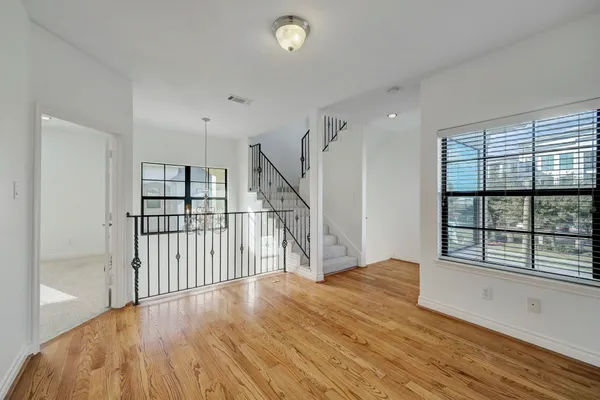 a view of entryway with wooden floor
