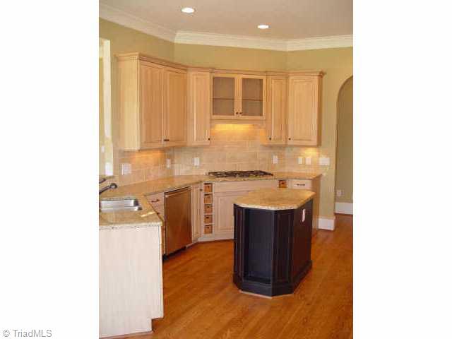 7017 Denison Road Summerfield, NC 27358 - Photo 3 of 9 Other. Gourmet kitchen with granite counter tops and Dacor stainless steel appliances.