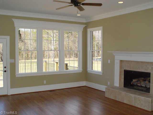 7017 Denison Road Summerfield, NC 27358 - Photo 5 of 9 Other. Spacious den with gas log fireplace.