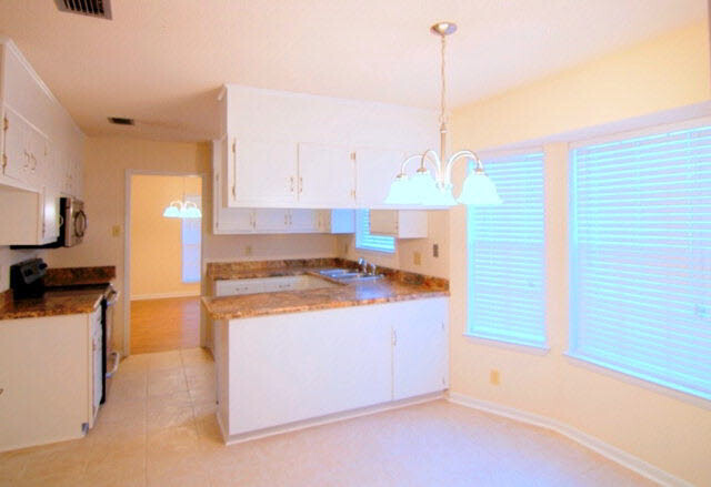 3384 Lacoste Road Mobile, AL 36618 - Photo 9 of 21 Breakfast Nook with tile flooring. 11 x 9