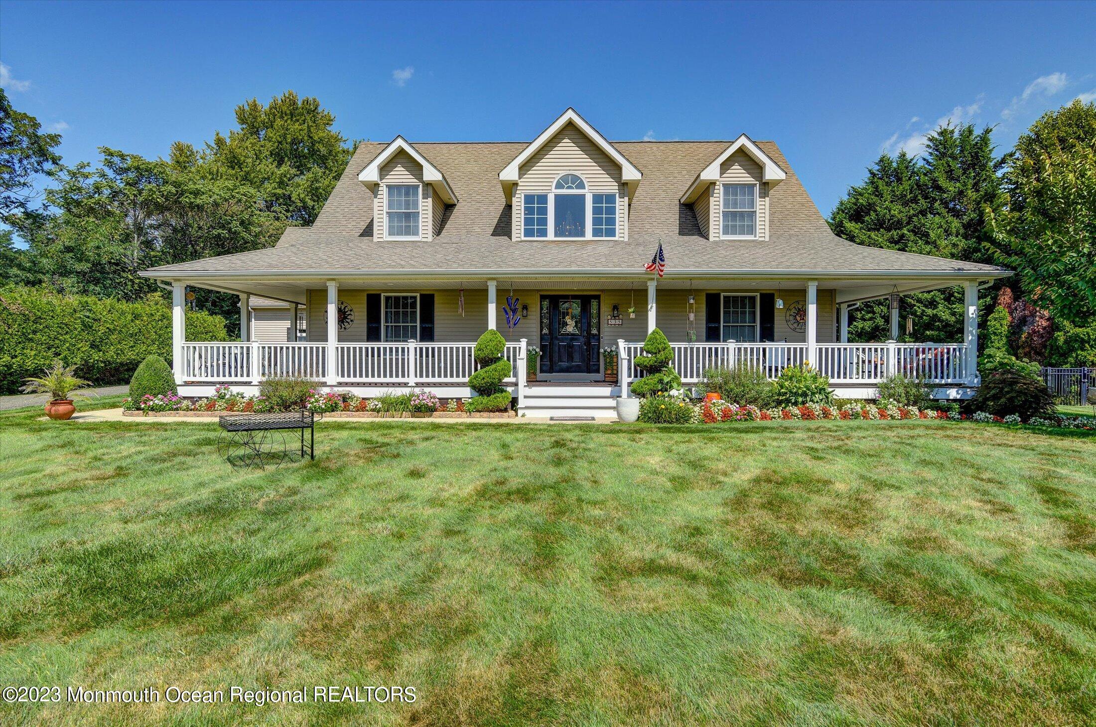 535 Brickyard Road Freehold, NJ 07728 - Photo 1 of 52 a front view of a house with a yard