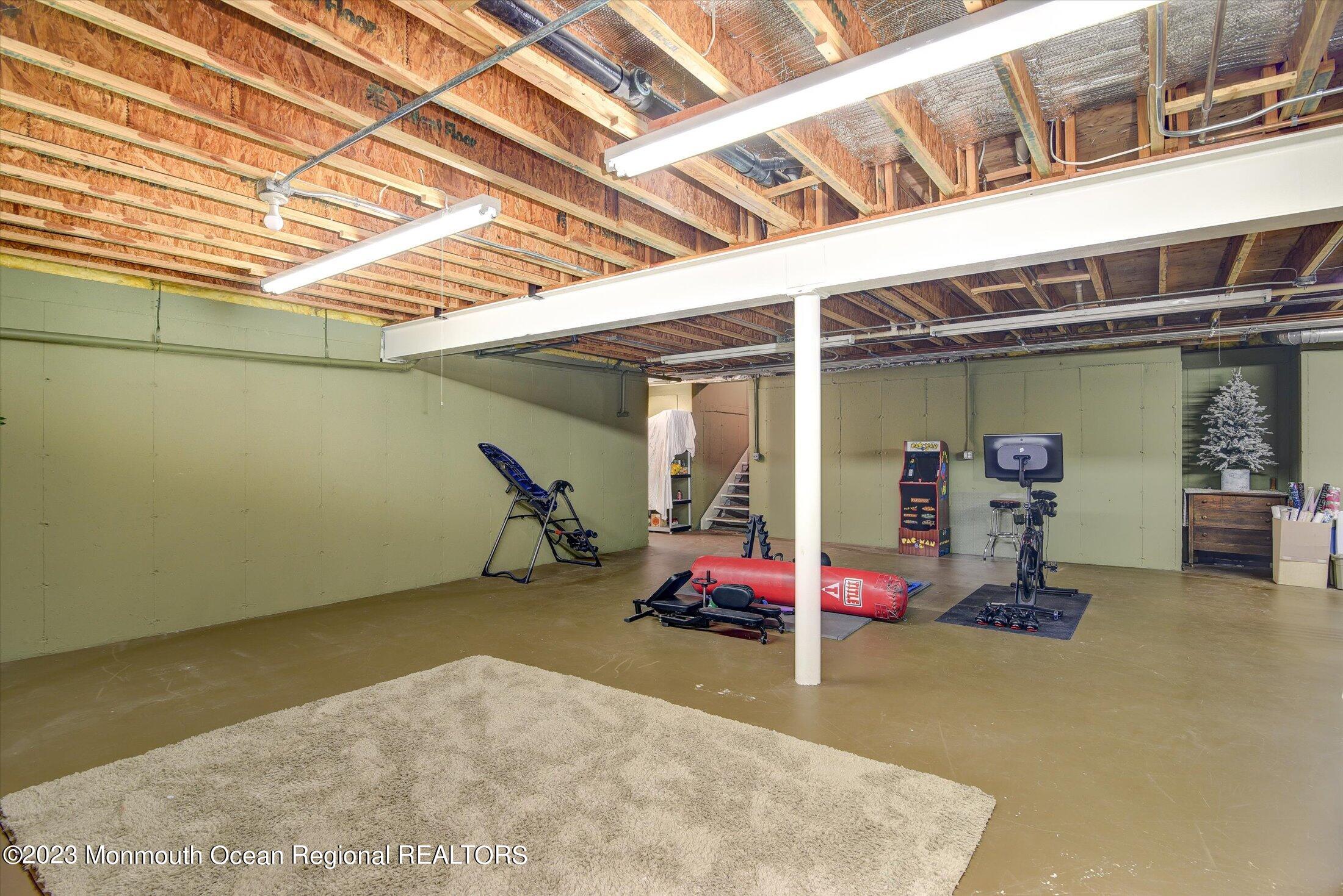 535 Brickyard Road Freehold, NJ 07728 - Photo 19 of 52 a view of a room with gym equipment