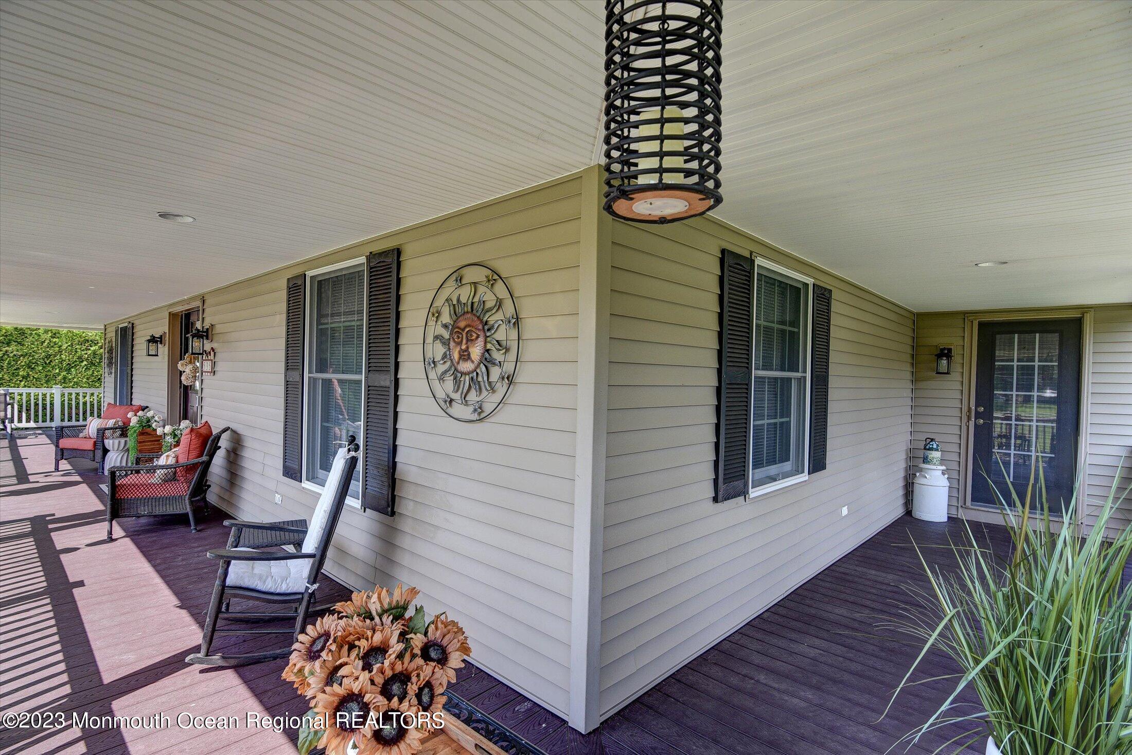 535 Brickyard Road Freehold, NJ 07728 - Photo 2 of 52 a front view of a house with garden