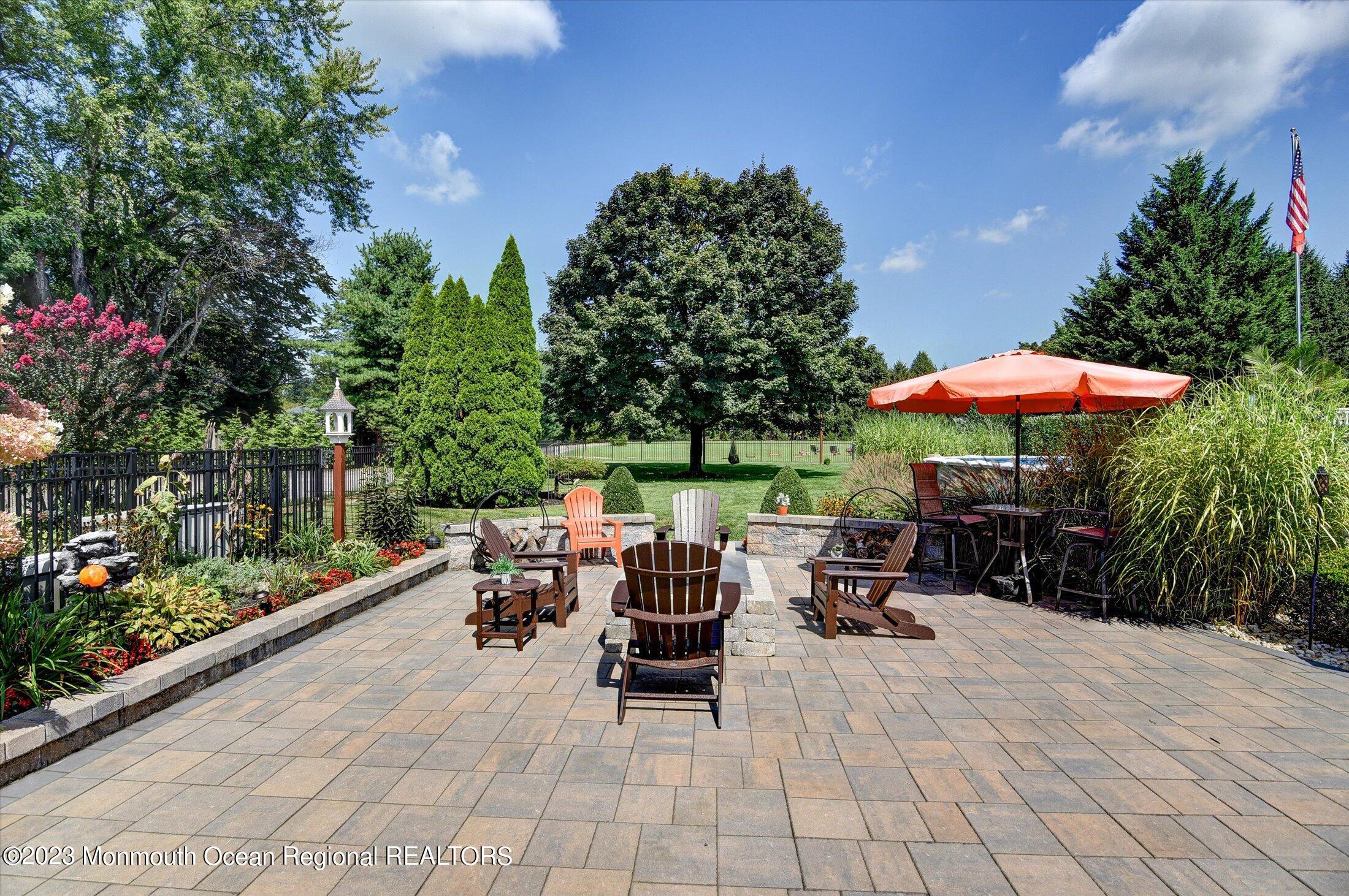 535 Brickyard Road Freehold, NJ 07728 - Photo 26 of 52 a view of chairs and tables in the patio