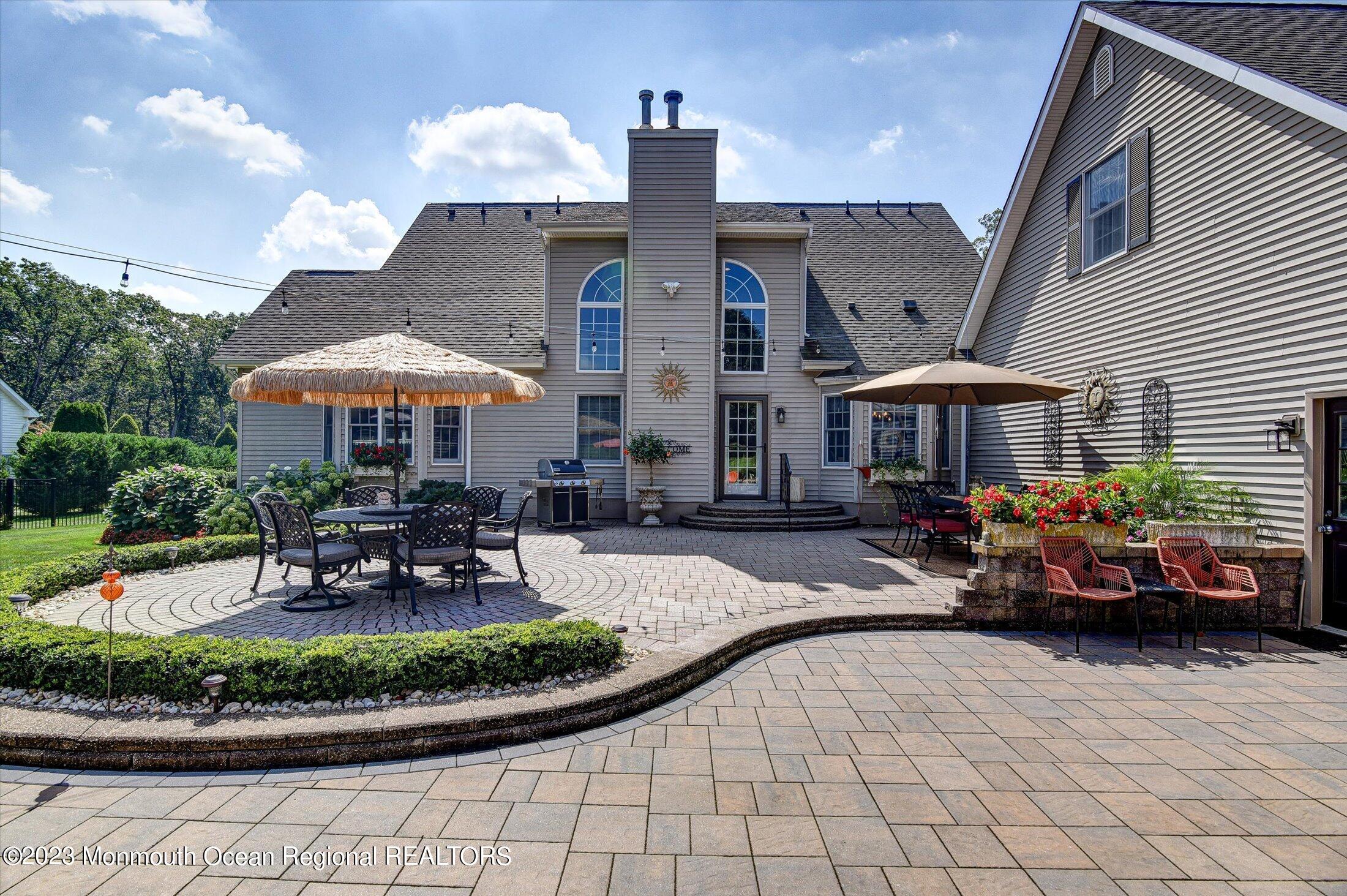 535 Brickyard Road Freehold, NJ 07728 - Photo 45 of 52 a view of a house with sitting area and furniture