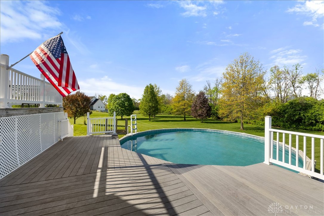 841 Willow Road Springfield, OH 45502 - Photo 40 of 64 Enjoy outdoor living with a spacious deck and inviting pool.