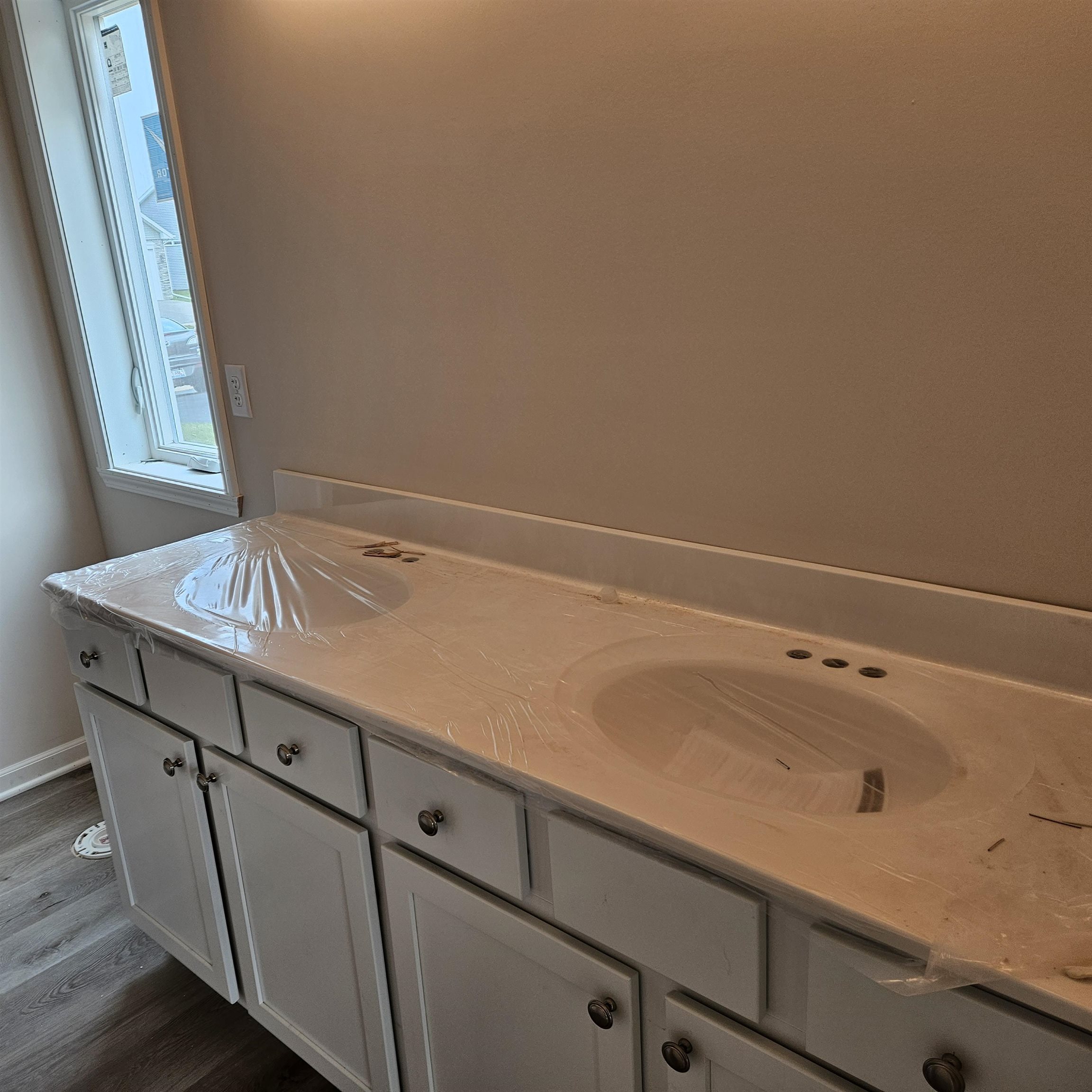 5552 Waters Bend Drive Belvidere, IL 61008 - Photo 10 of 12 a bathroom with a sink and a mirror