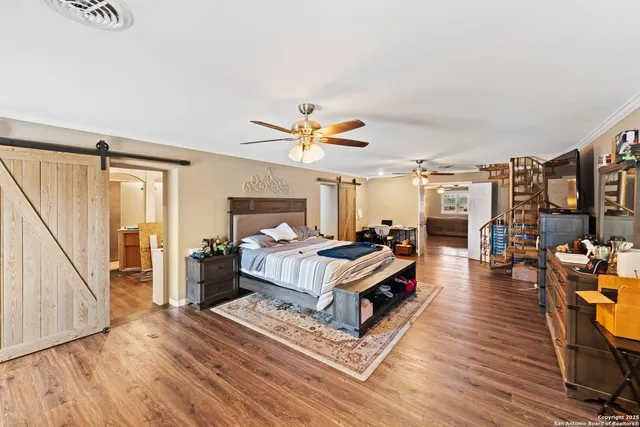 a bed room with a bed and a window