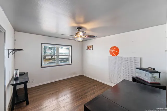 a view of a livingroom with a workspace