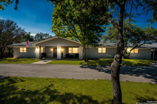a house with trees in the background