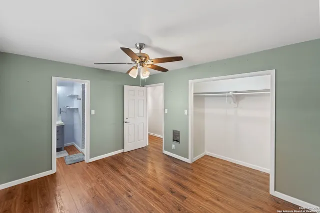 a bathroom with a sink a vanity and a mirror