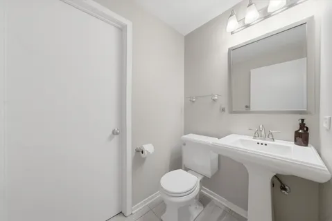 a bathroom with a sink and a toilet
