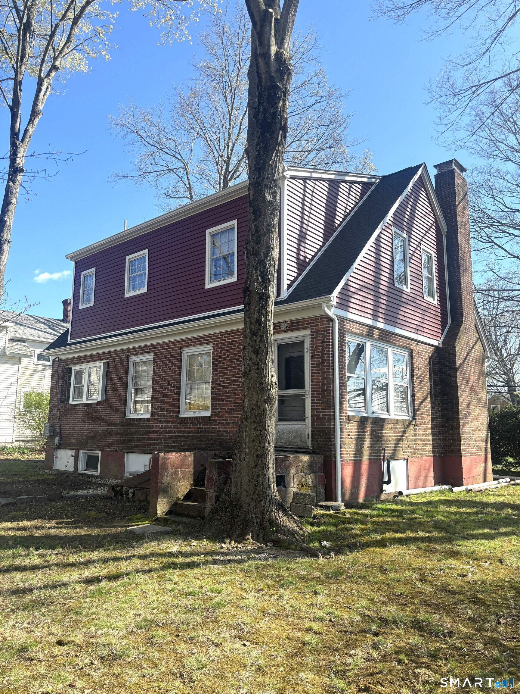136 Broadway Street Colchester, CT 06415 - Photo 3 of 35 a front view of a house with a yard