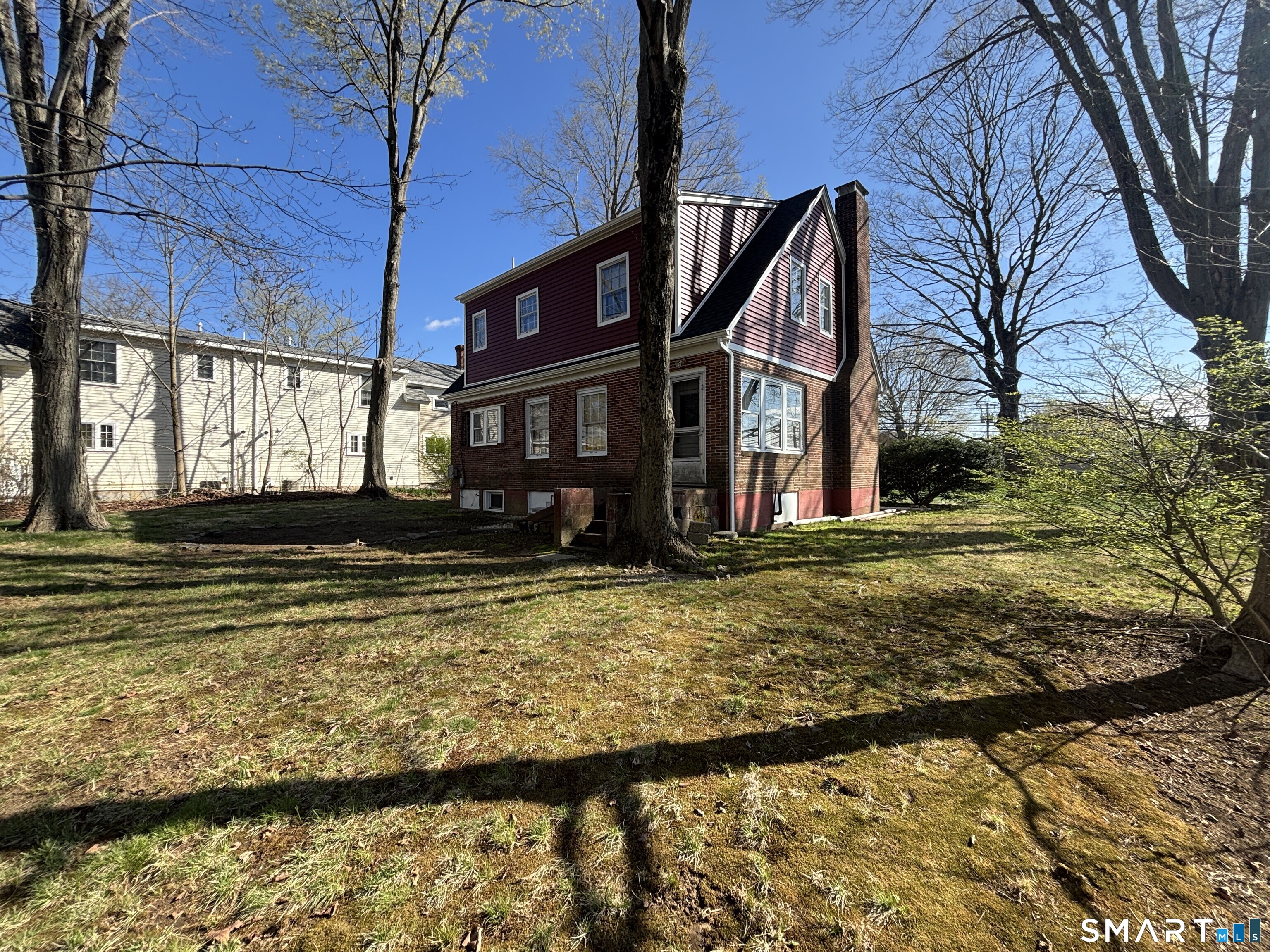 136 Broadway Street Colchester, CT 06415 - Photo 33 of 35 a front view of a house with a yard