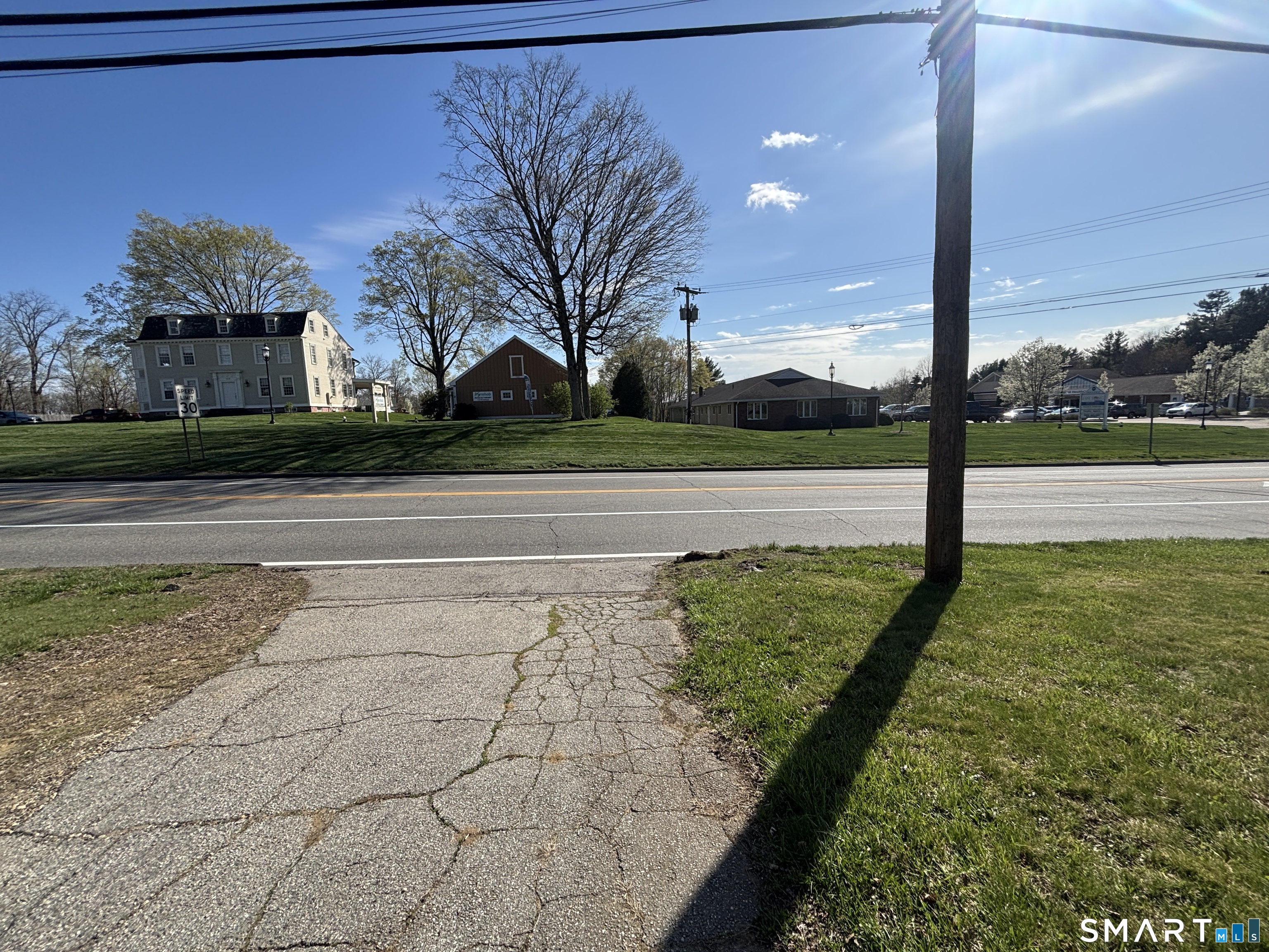 136 Broadway Street Colchester, CT 06415 - Photo 35 of 35 a view of a street with a building in the background