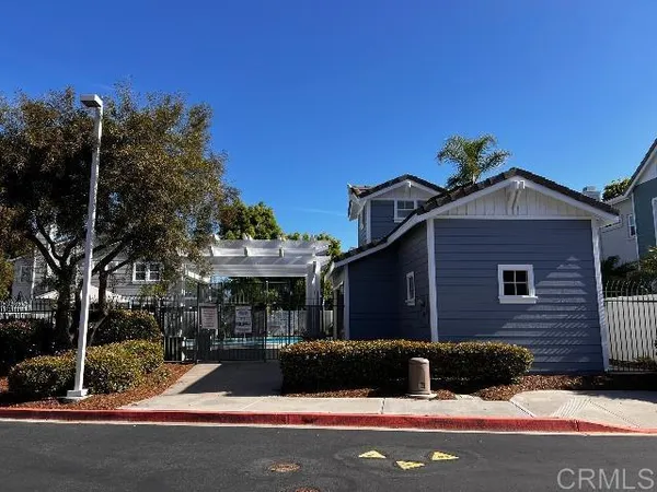 a house with yard in front of it