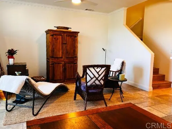 a kitchen with a stove a sink and a cabinets