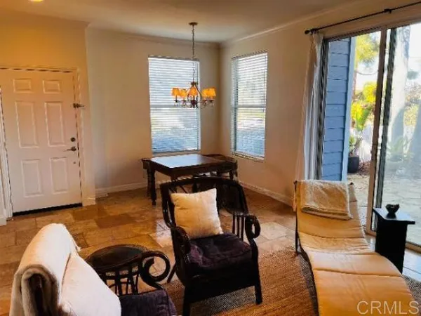 a kitchen with stainless steel appliances granite countertop a refrigerator sink and stove