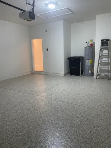 a kitchen with stainless steel appliances a refrigerator sink stove microwave and cabinets