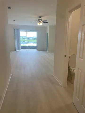 a view of a lake with a building in the background