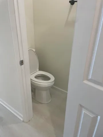 a view of a swimming pool with a chair