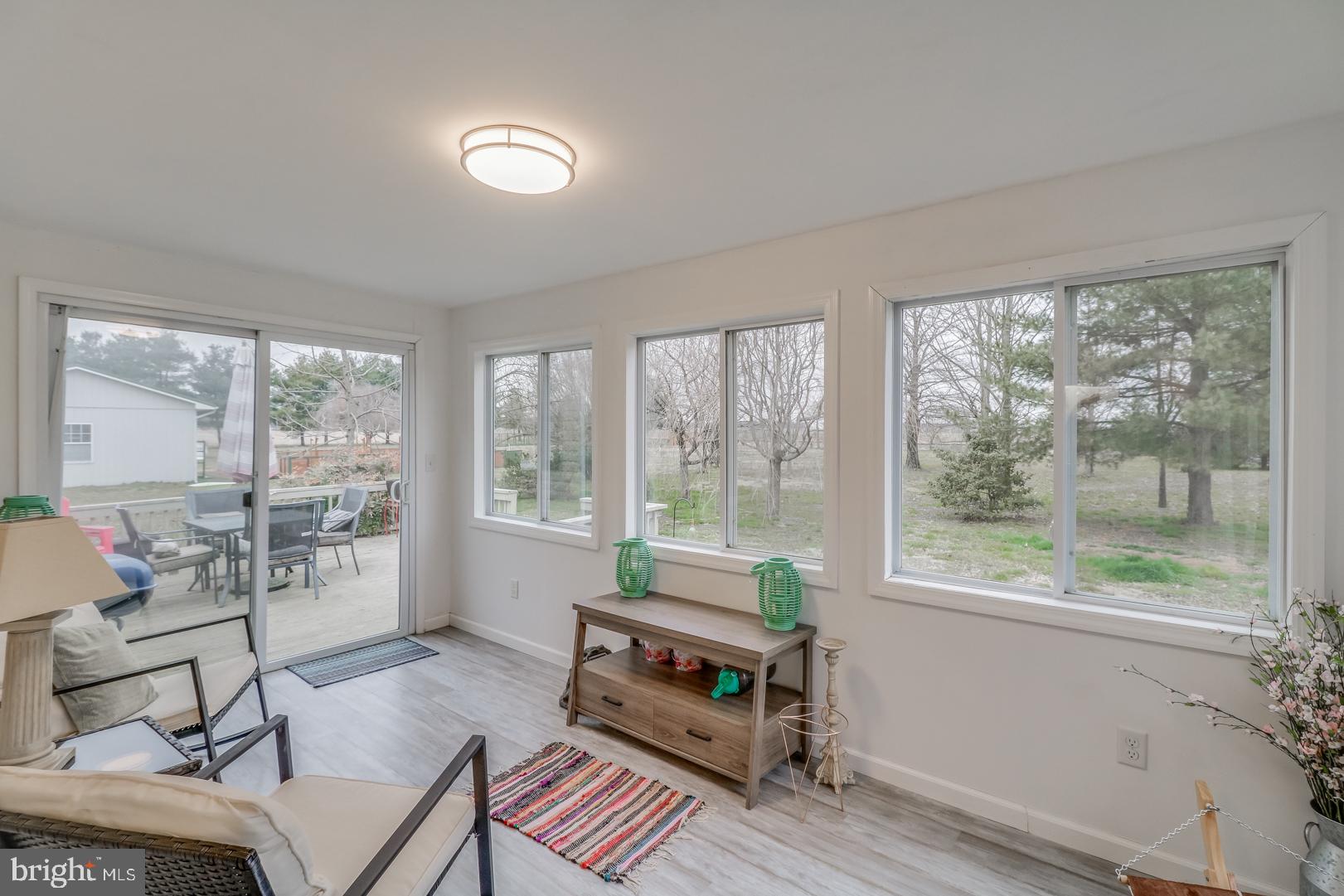12205 Galena Road Massey, MD 21650 - Photo 14 of 34 Light & Bright Sunroom