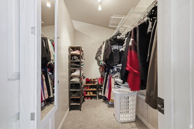 830 North Stone Road Snowville, UT 84336 - Photo 30 of 69 Walk in closet featuring light colored carpet