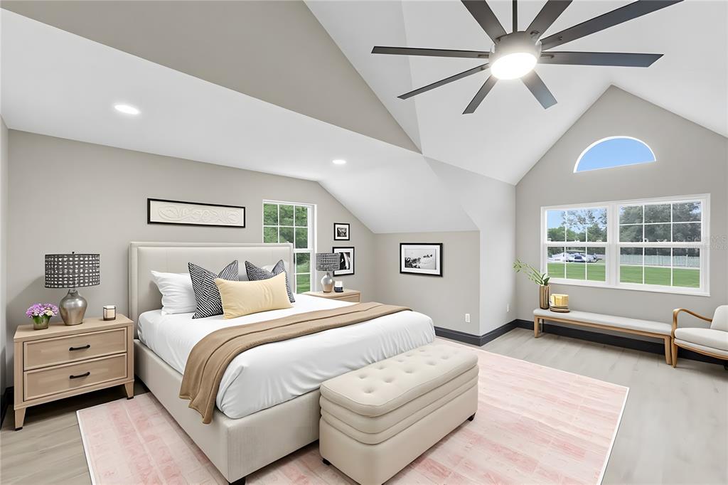 14728 Henson Road Orlando, FL 32832 - Photo 72 of 79 a spacious bedroom with a bed and a large window