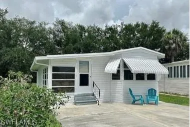 a front view of a house with a garage