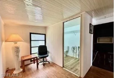 a workspace with furniture and a window