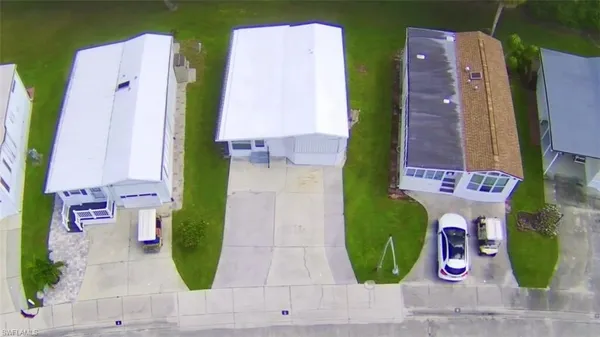 an aerial view of a residential apartment building with entryway