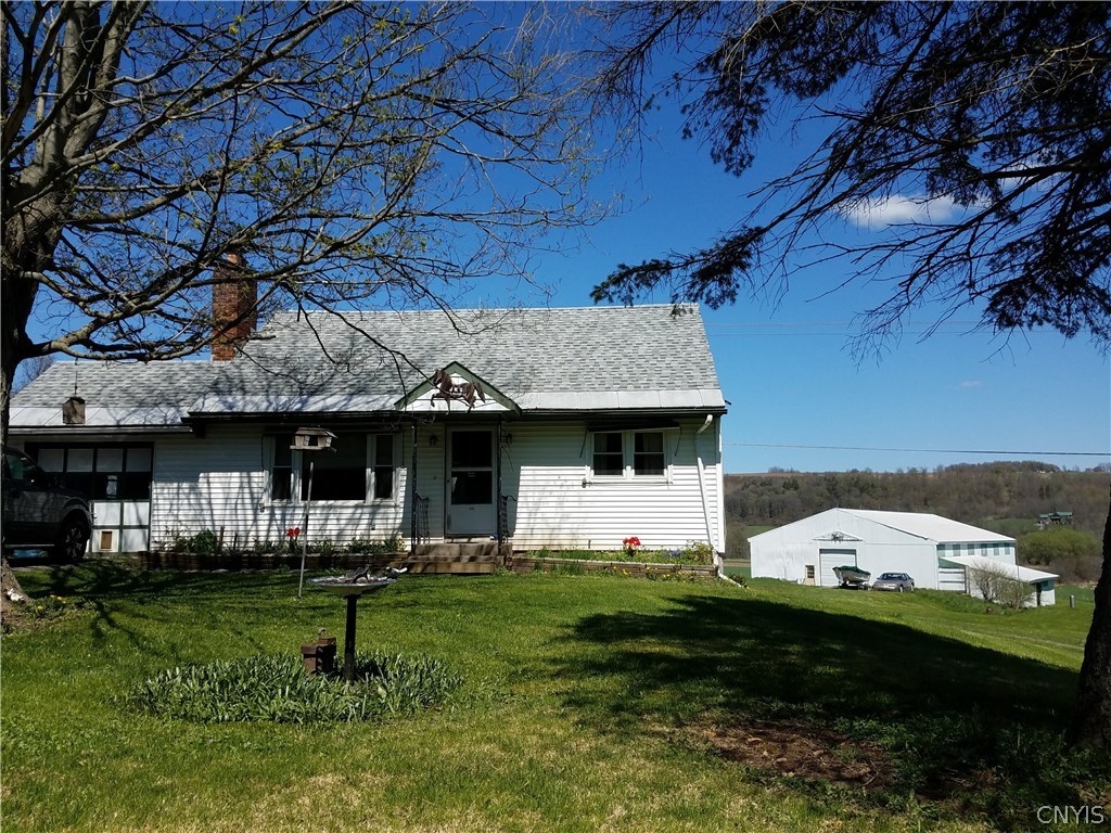 3362 Williams Road Marcellus, NY 13108 - Photo 1 of 1 Front of house with attached garage to left(out of