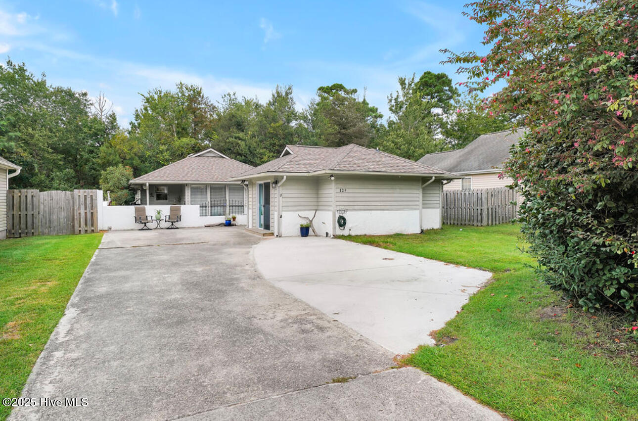 129 Red Bird Lane Hampstead, NC 28443 - Photo 2 of 37 Home is set back off of the road