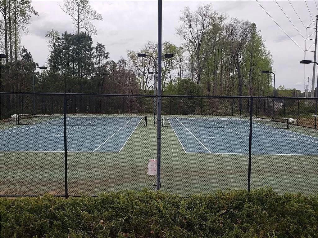 3050 A Centerglen Lane Cumming, GA 30040 - Photo 10 of 10 a view of a tennis court
