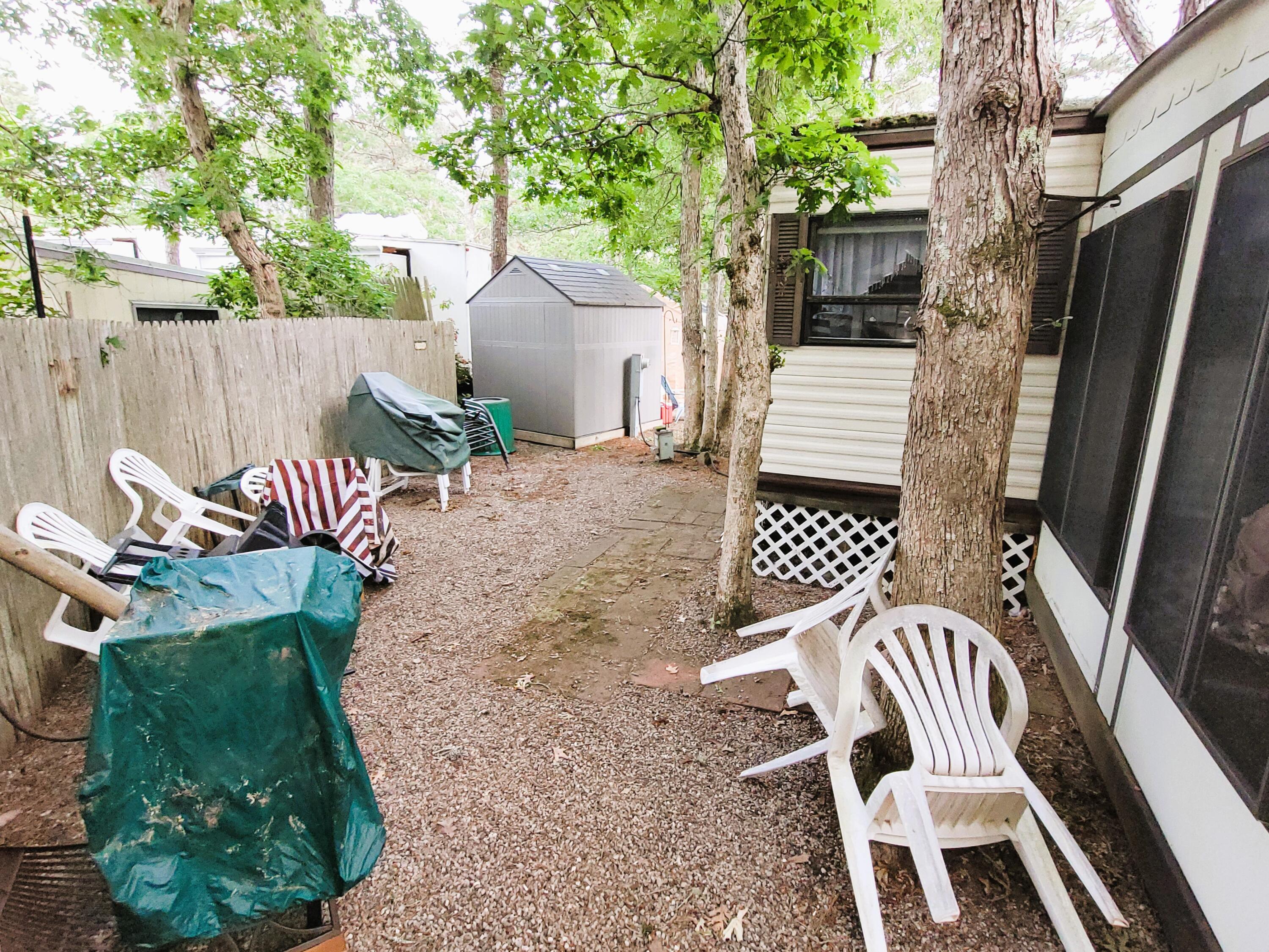 310 Old Chatham Road, Unit H12 South Dennis, MA 02660 - Photo 11 of 55 a view of outdoor space yard and patio