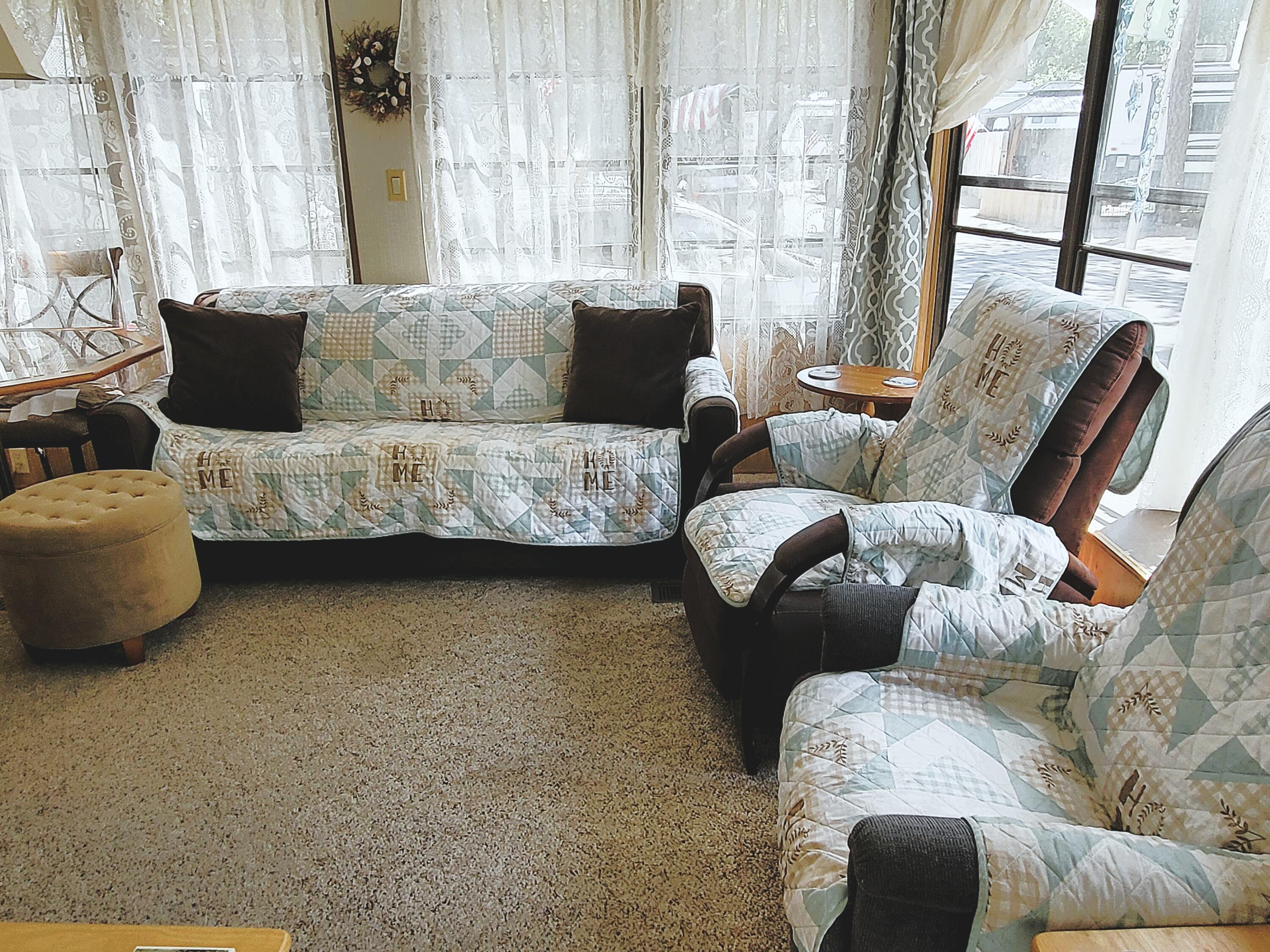 310 Old Chatham Road, Unit H12 South Dennis, MA 02660 - Photo 47 of 55 a living room with furniture and a large window