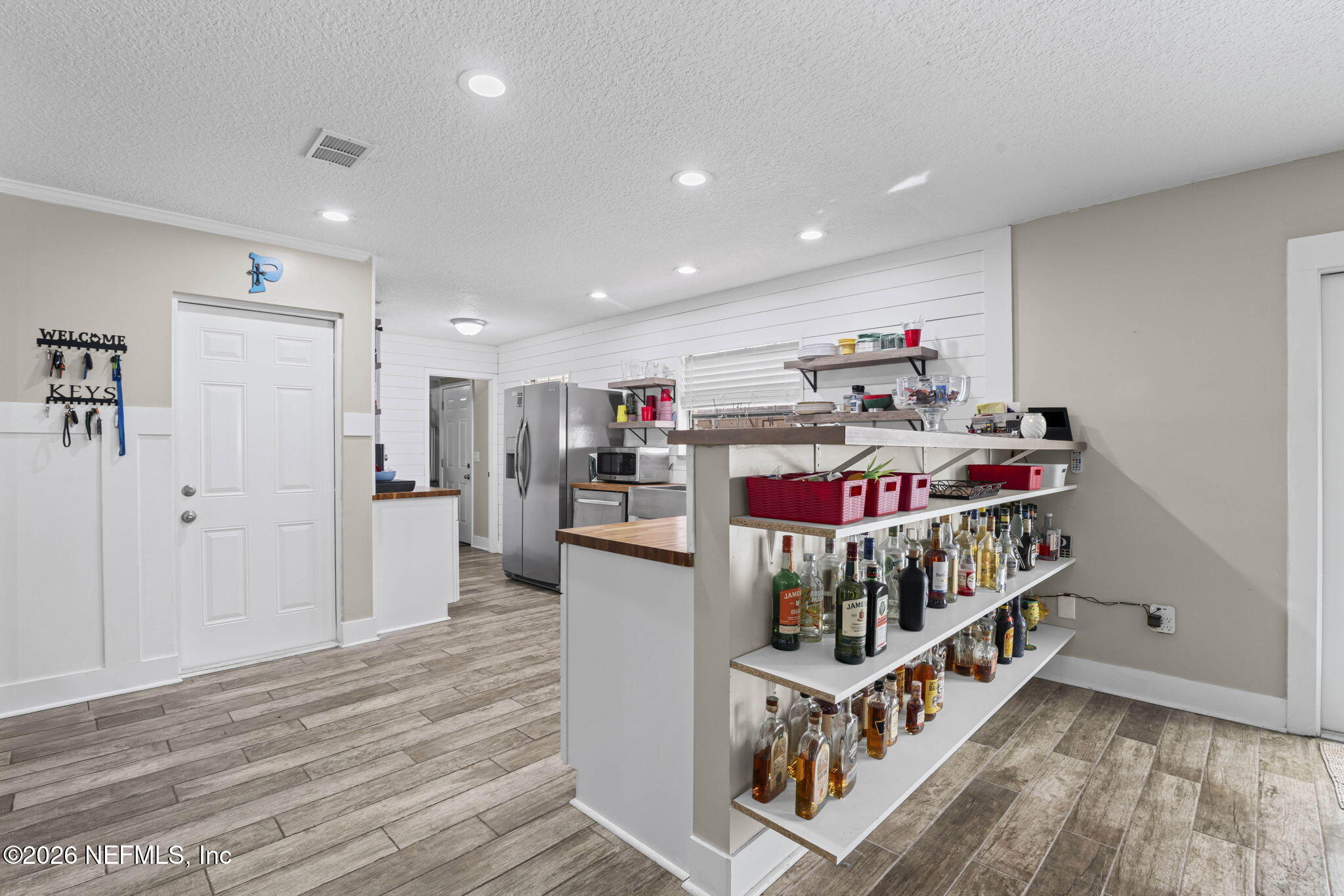 3084 Joe Johns Road Middleburg, FL 32068 - Photo 11 of 52 a room with furniture and a wooden floor