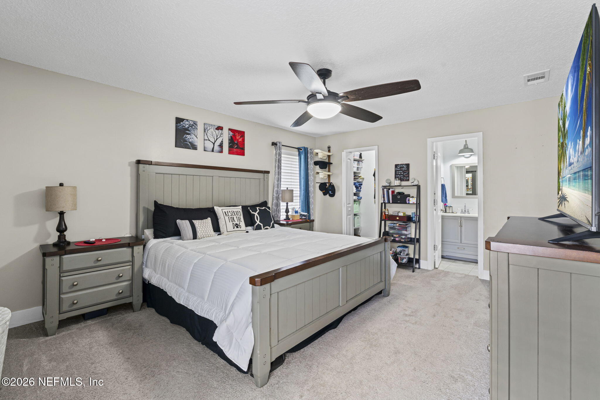 3084 Joe Johns Road Middleburg, FL 32068 - Photo 18 of 52 a bedroom with a bed closet and a window