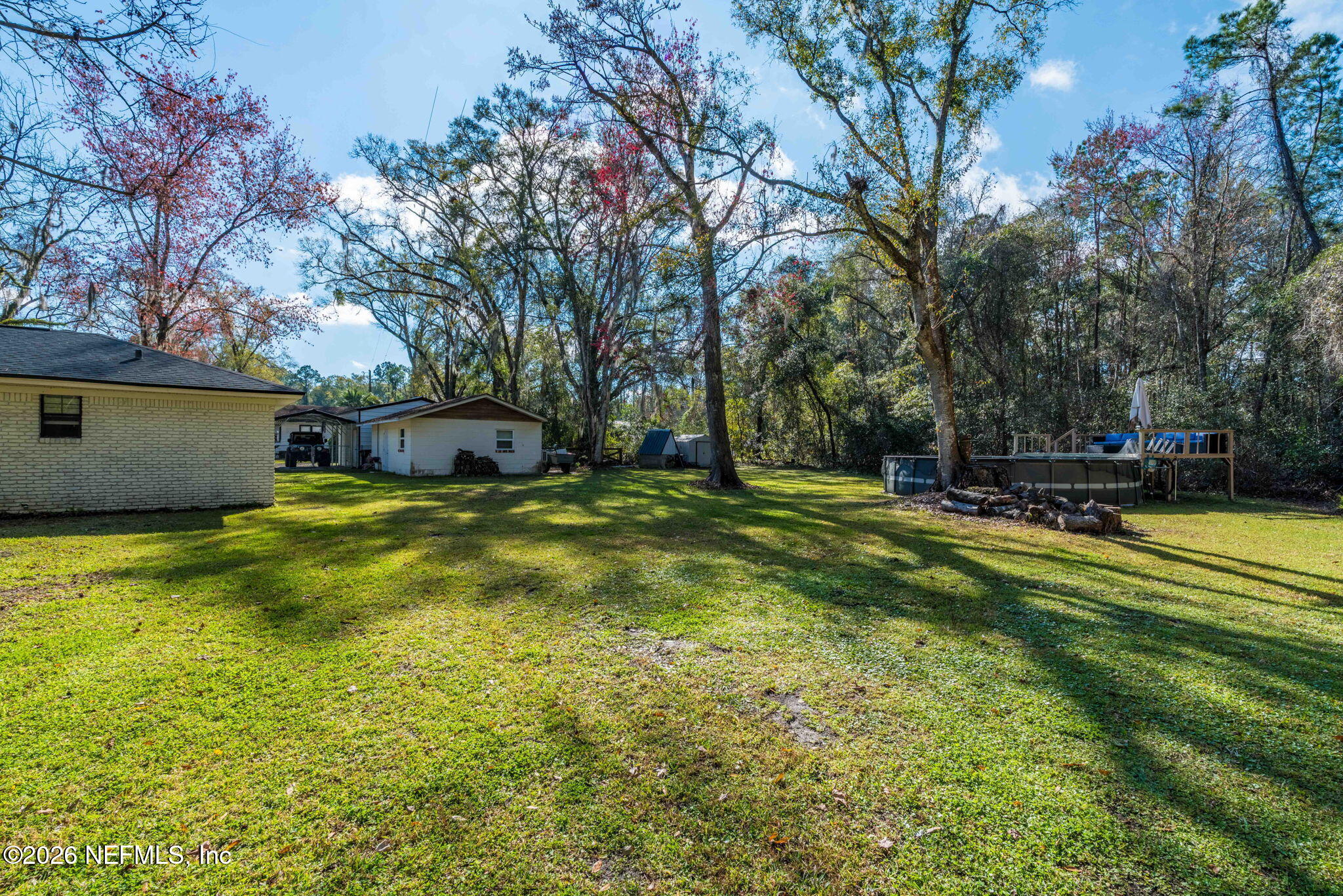 3084 Joe Johns Road Middleburg, FL 32068 - Photo 30 of 52 a view of a house with a big yard