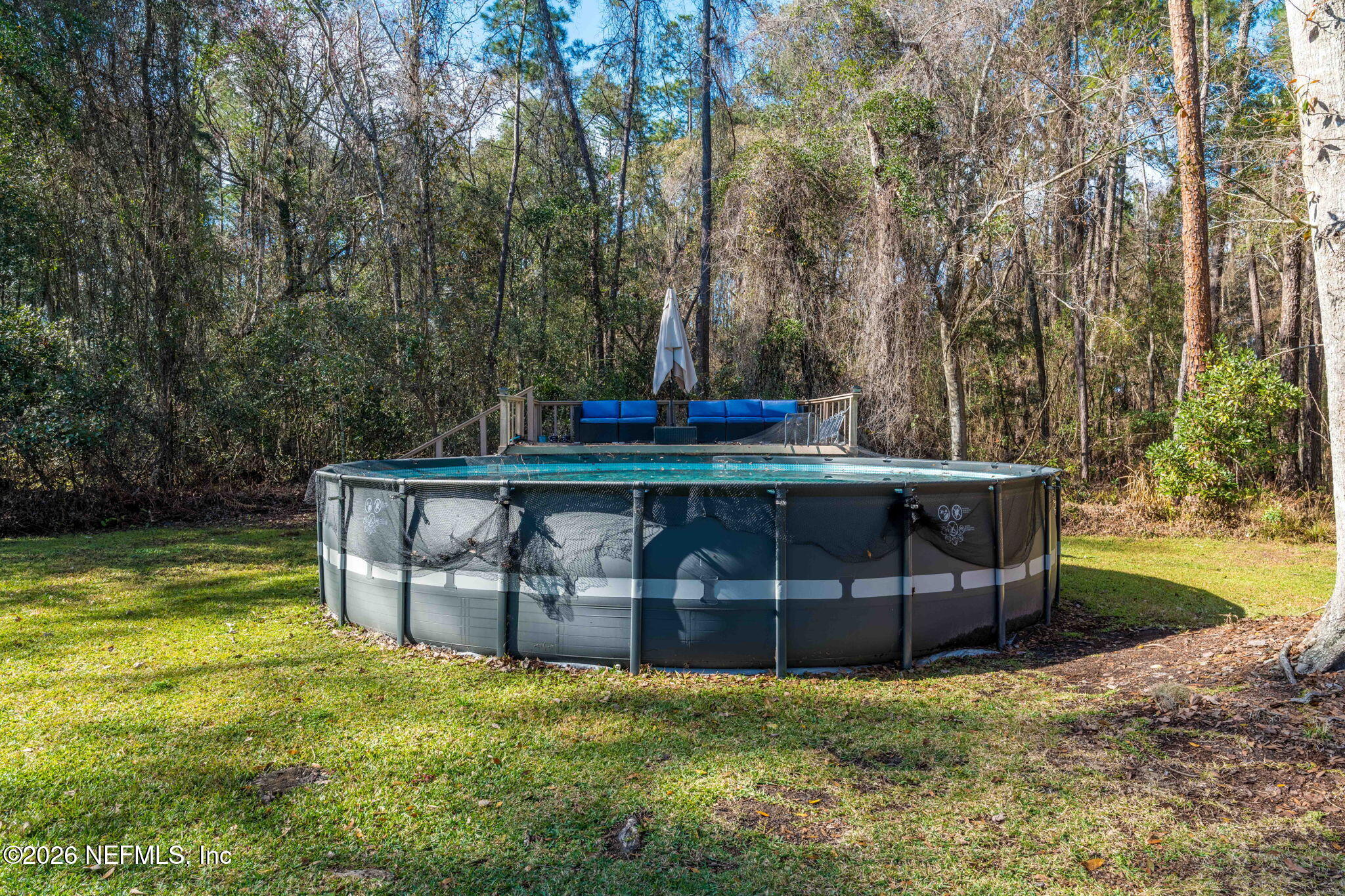 3084 Joe Johns Road Middleburg, FL 32068 - Photo 31 of 52 a view of a house with backyard and sitting area