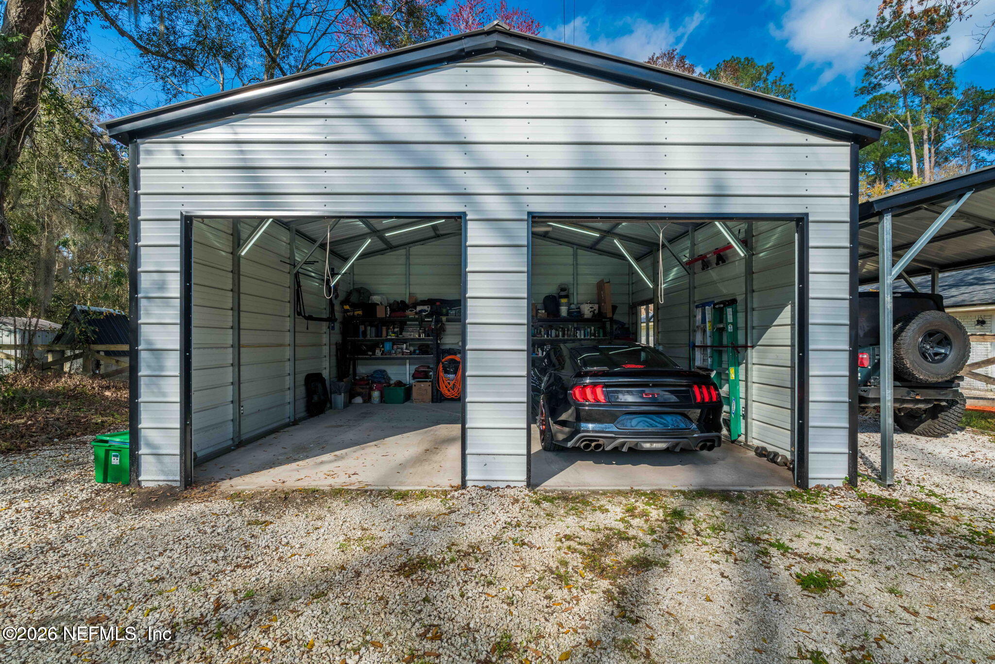 3084 Joe Johns Road Middleburg, FL 32068 - Photo 37 of 52 a view of a car park in front of a house
