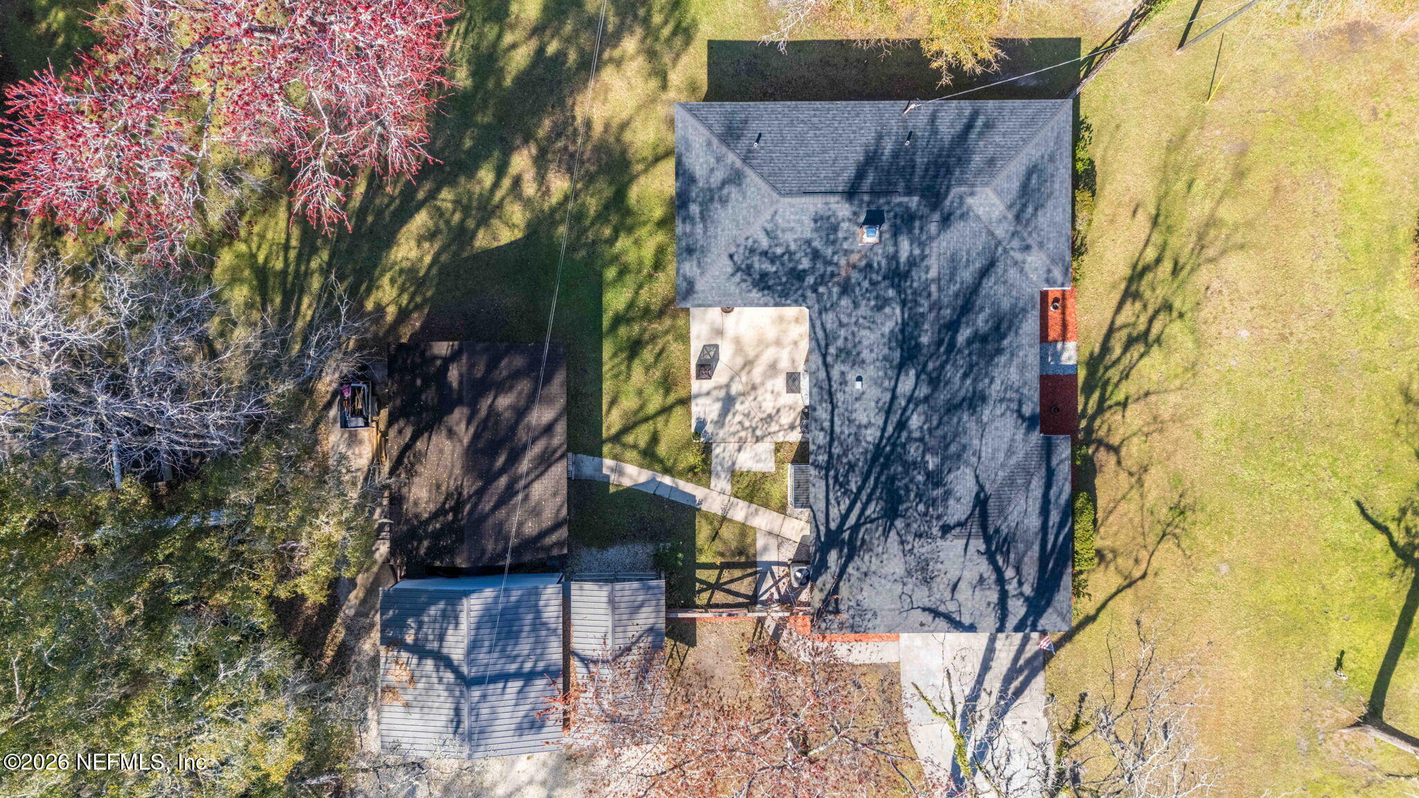 3084 Joe Johns Road Middleburg, FL 32068 - Photo 43 of 52 a backyard of a house with table and chairs