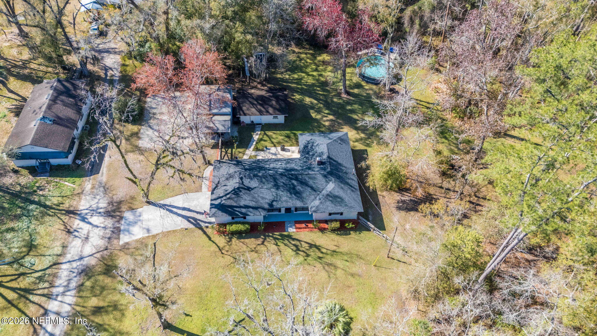 3084 Joe Johns Road Middleburg, FL 32068 - Photo 44 of 52 a bed in a yard next to a building