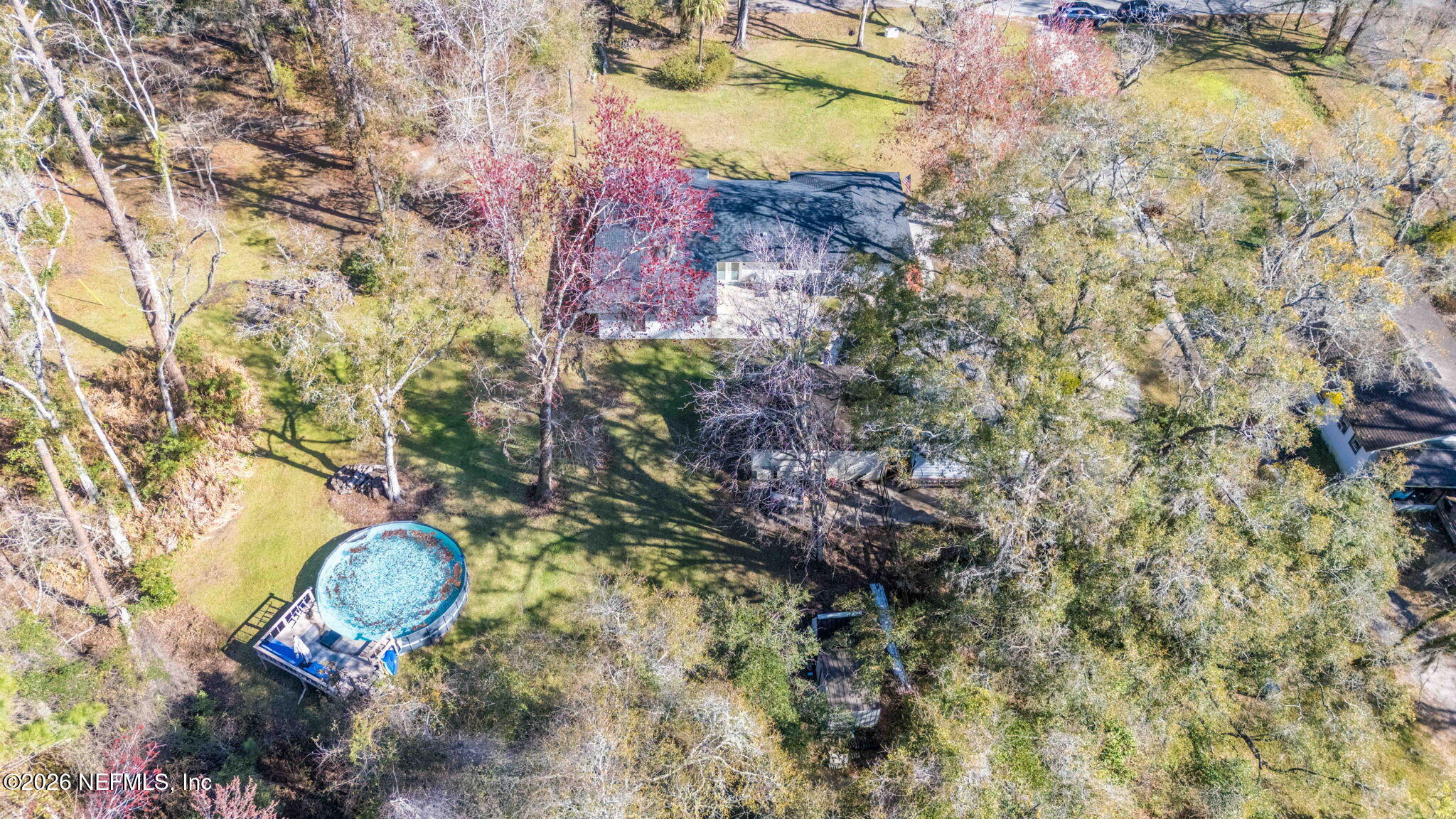 3084 Joe Johns Road Middleburg, FL 32068 - Photo 46 of 52 a aerial view of a house with a yard and large trees