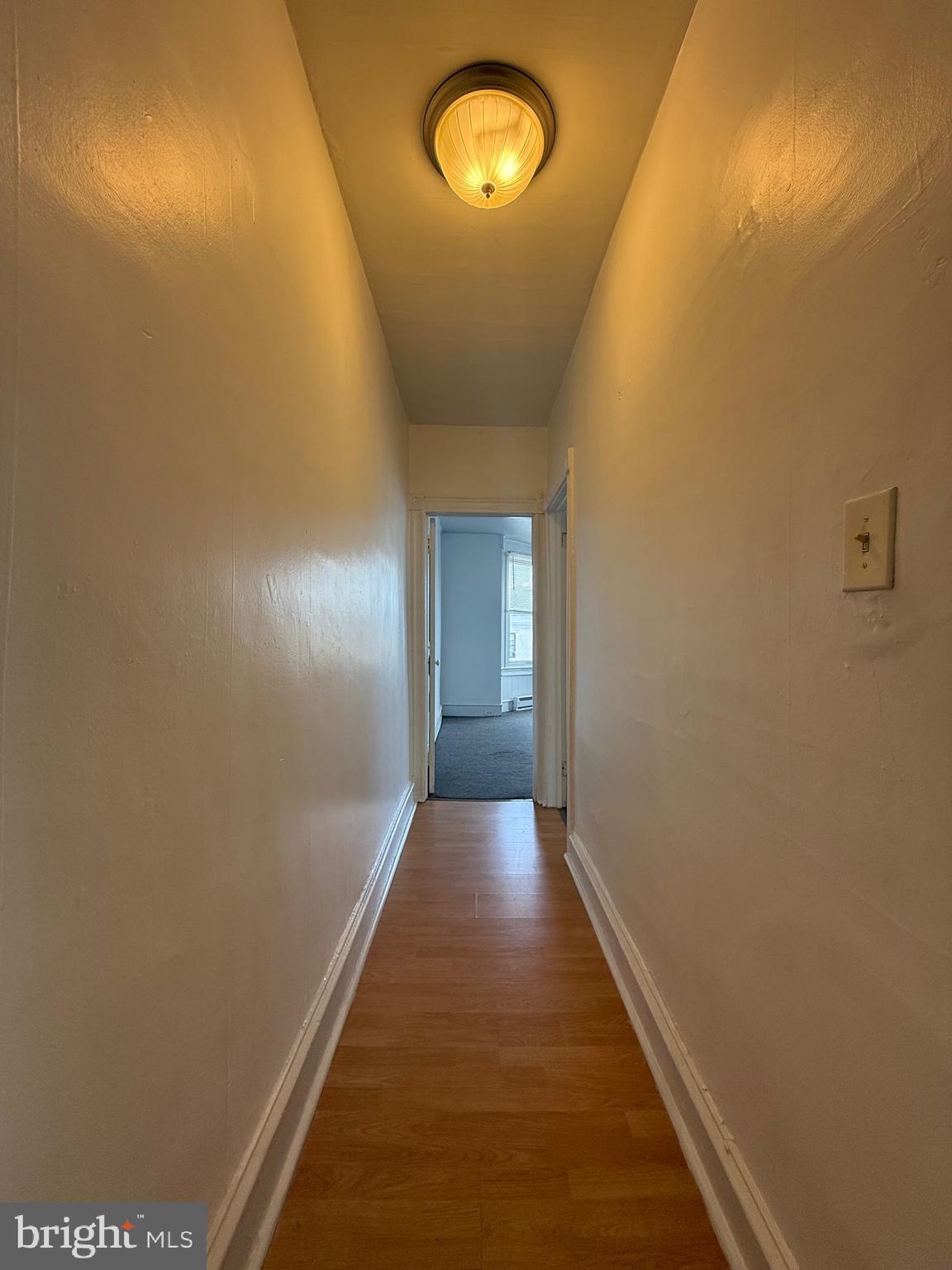 5700 Chestnut Street, Unit 3A Philadelphia, PA 19139 - Photo 2 of 8 a view of a hallway