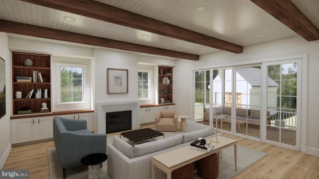 a living room with furniture a fireplace and a floor to ceiling window