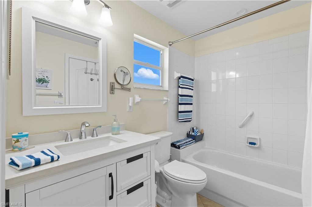 2266 Stacil Circle, Unit 3 Naples, FL 34109 - Photo 23 of 49 Full bath featuring vanity and shower / bathtub combination