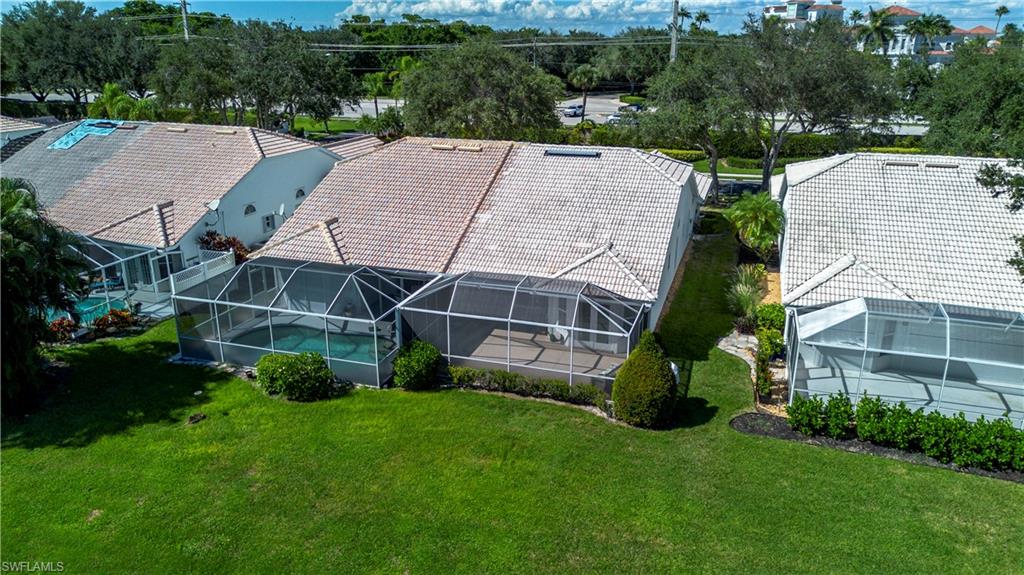 2266 Stacil Circle, Unit 3 Naples, FL 34109 - Photo 47 of 49 Aerial perspective of suburban area