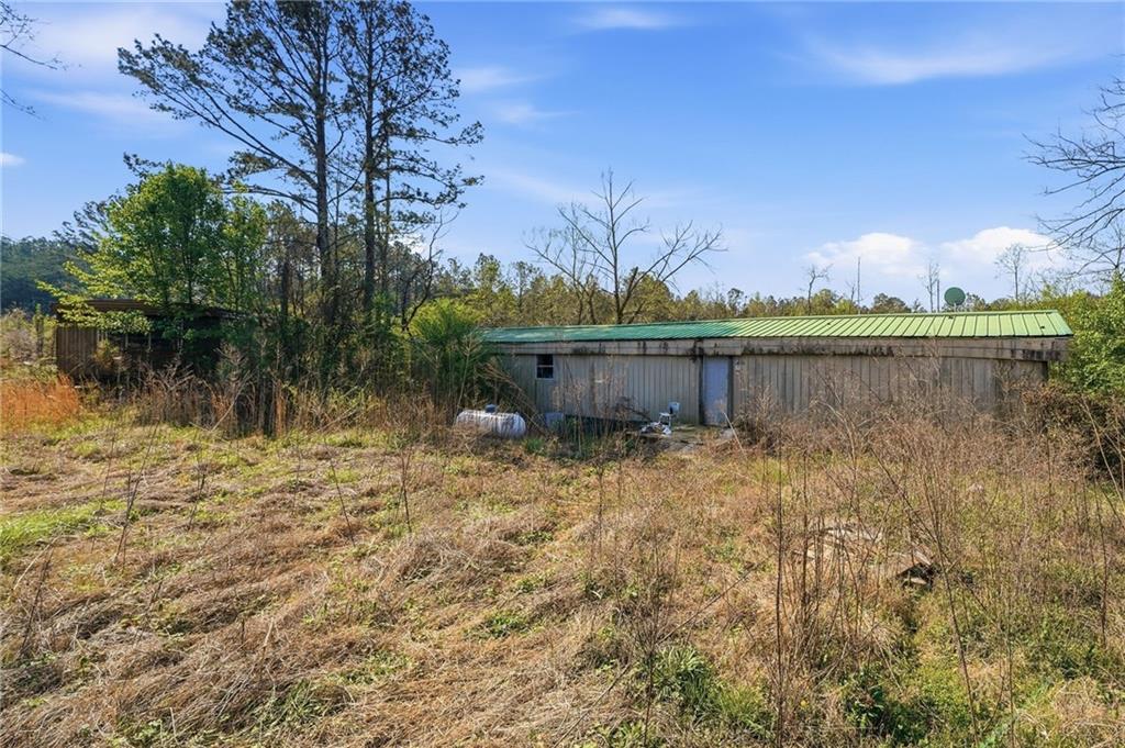 17 Line Crest Drive Ball Ground, GA 30107 - Photo 17 of 18 a view of a lake with houses in the back